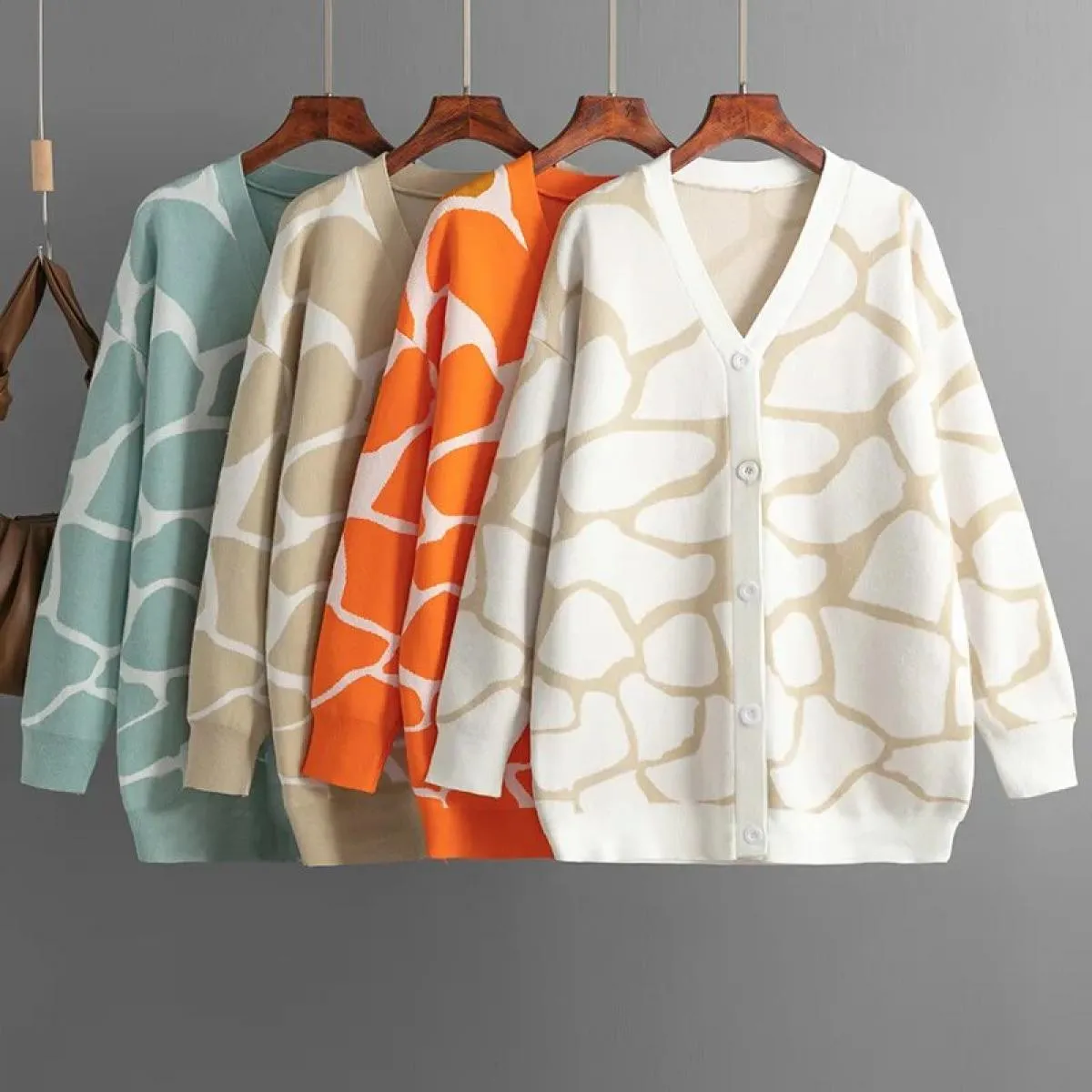 2023 nuove donne autunno inverno maglione jacquard scollo a V modello lungo cappotto allentato