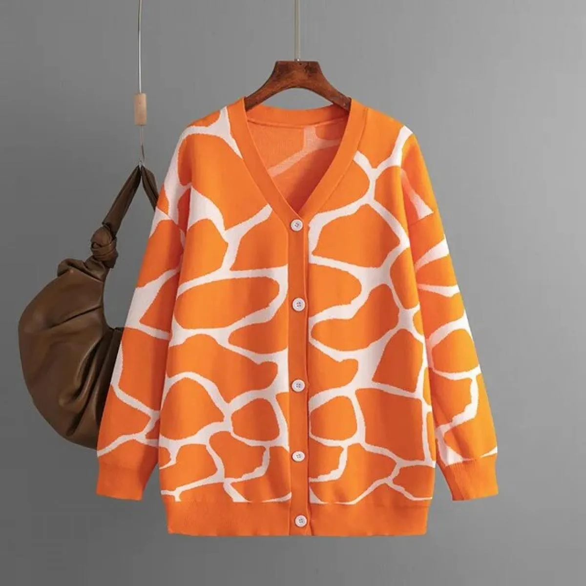 2023 nuove donne autunno inverno maglione jacquard scollo a V modello lungo cappotto allentato