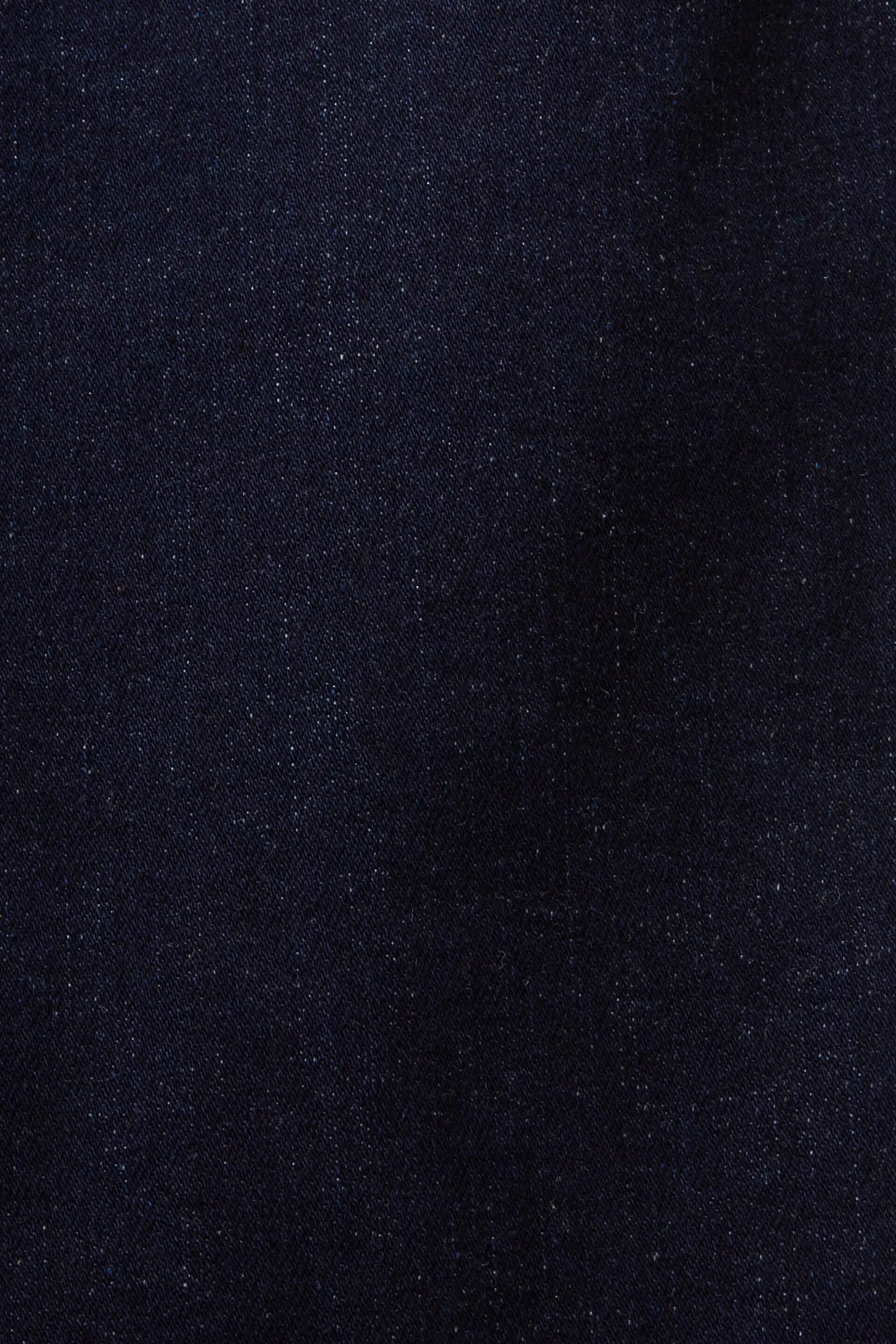 In materiale riciclato: jeans slim fit stretch a vita media